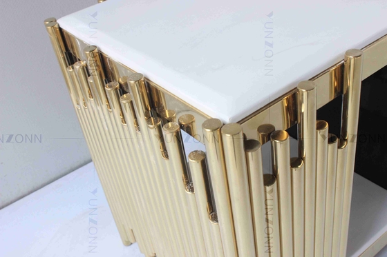 Il bianco del salone e la Tabella di console dell'oro TV marmorizzano l'acciaio inossidabile superiore con i cassetti