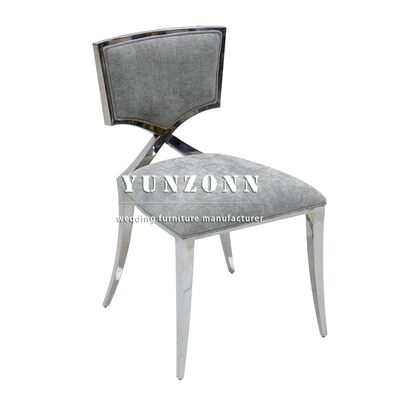 Prezzo buono Sedia per banchetti per hotel dal design speciale in acciaio inossidabile con telaio argentato per eventi e cene in linea