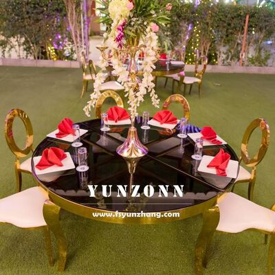 Prezzo buono Tavolo da pranzo di lusso moderno in acciaio inossidabile con piano in vetro per matrimoni all'aperto, hotel, feste, banchetti, design rotondo in linea