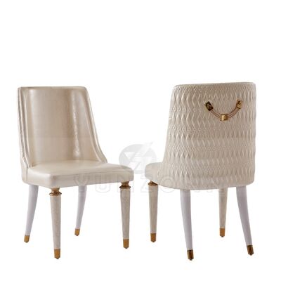 Prezzo buono Sedia da pranzo moderna in pelle in vendita per uso interno ed esterno con braccioli in acciaio inossidabile per hotel e soggiorni in linea